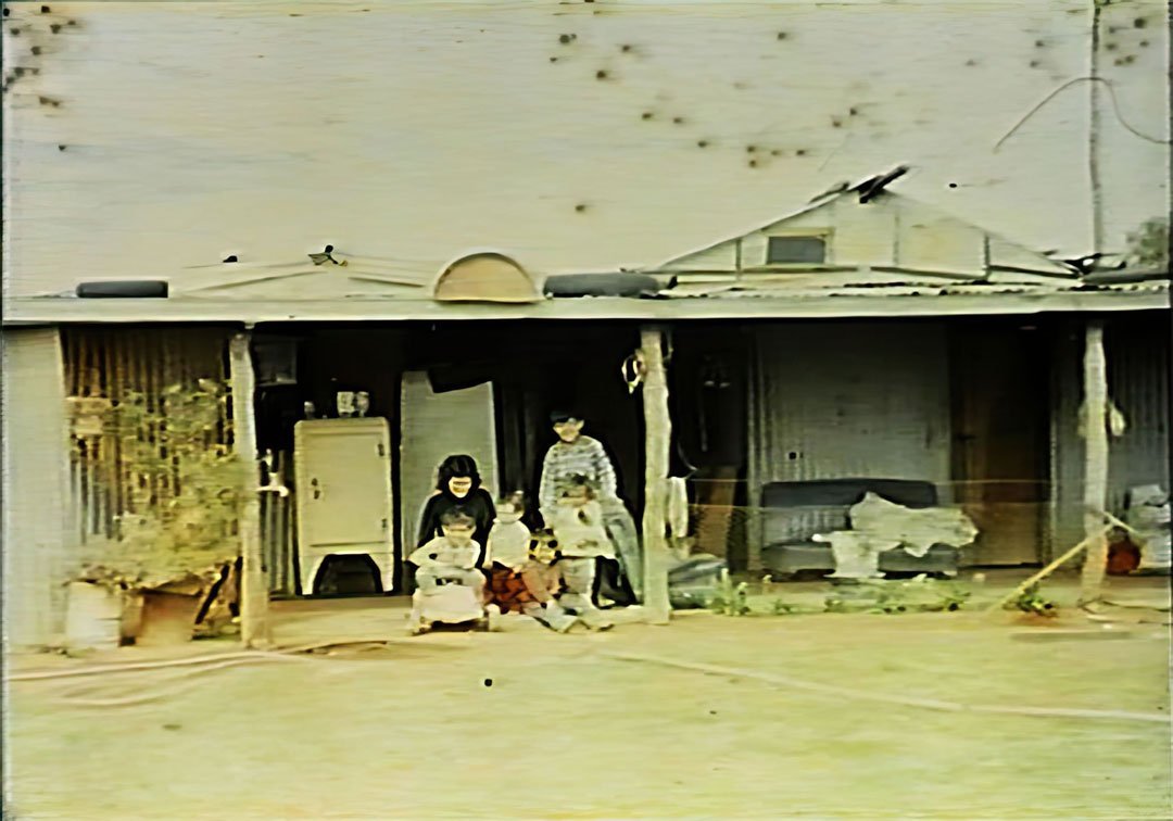 Reece George with cousins on the verandah of Beyondie Station in 1969